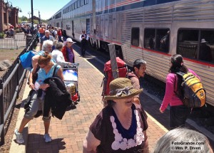 Long-waiting passengers surge toward the Southwest Chief in Flagstaff. Photo © William P. Diven.