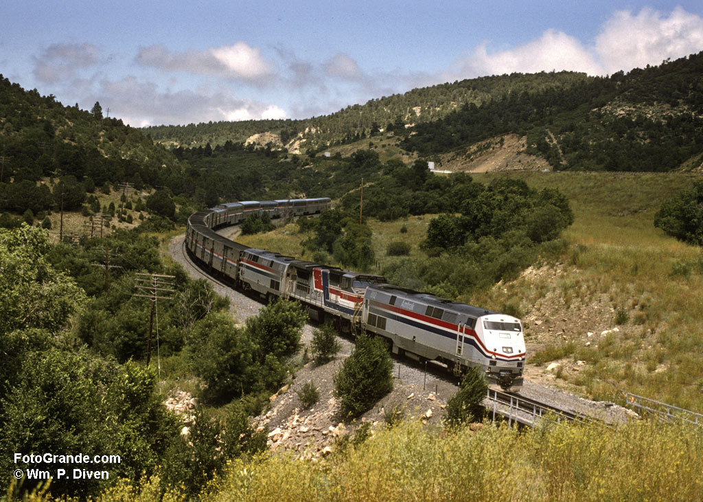The Southwest Chief follows the Santa Fe Trail down from Raton Pass. Photo © William P. Diven 1995.
